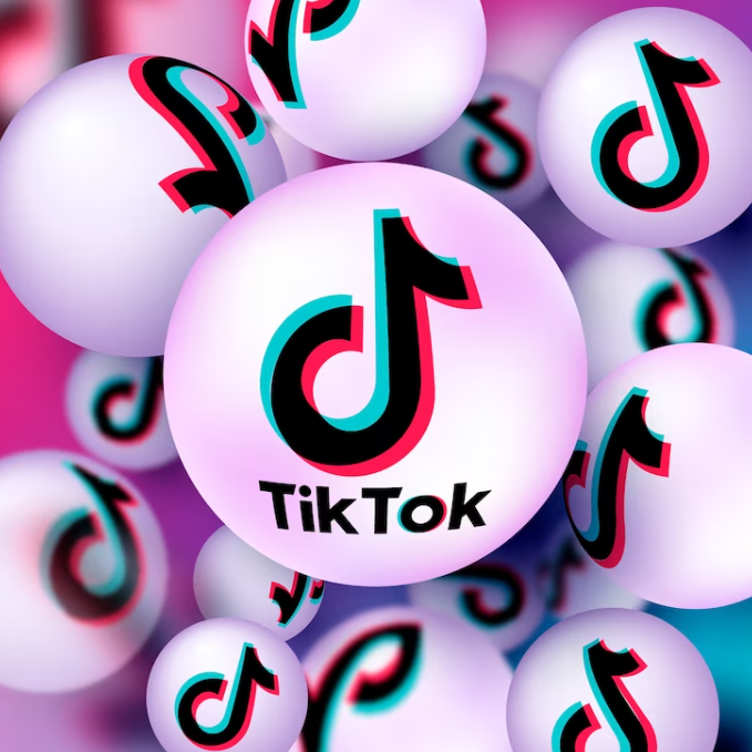 tiktok logo on the 3d balls, one is ahead of others has word tiktok on it