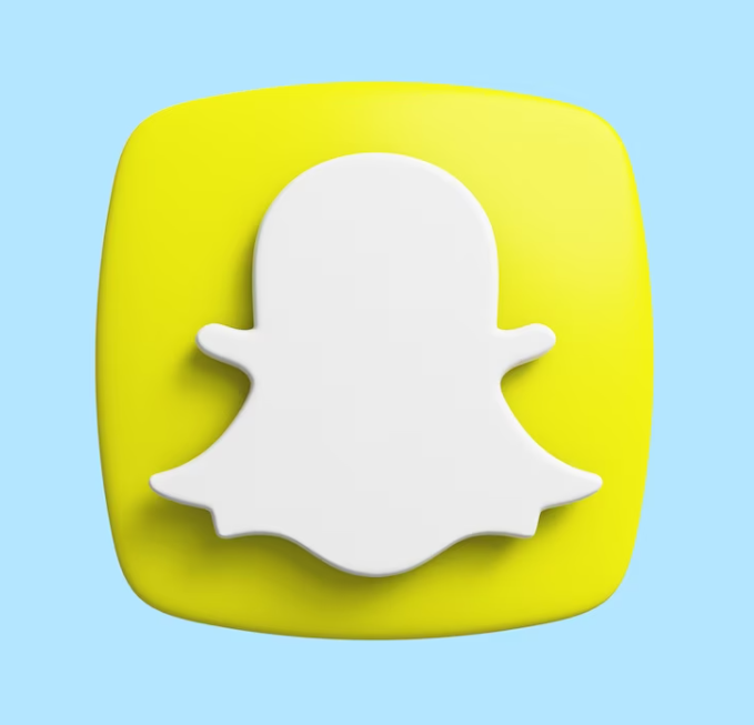 white 3d icon of Snapchat in a yellow square around a blue background