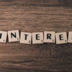 Pinterest letters on dark wooden table