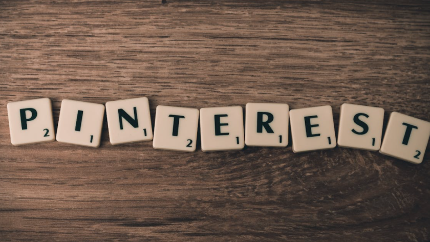 Pinterest letters on dark wooden table