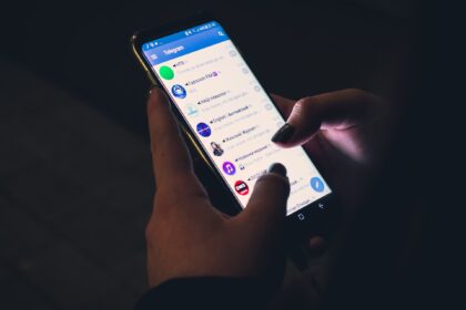 a man opened the telegram application on his phone