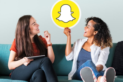 Women Showing Snapchat Icon